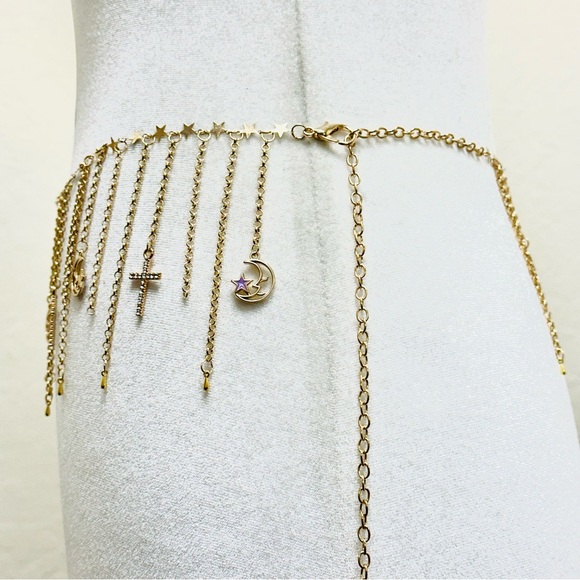 Gold waist chain belt with crosses, stars, and moon charms - Picture 2 of 3